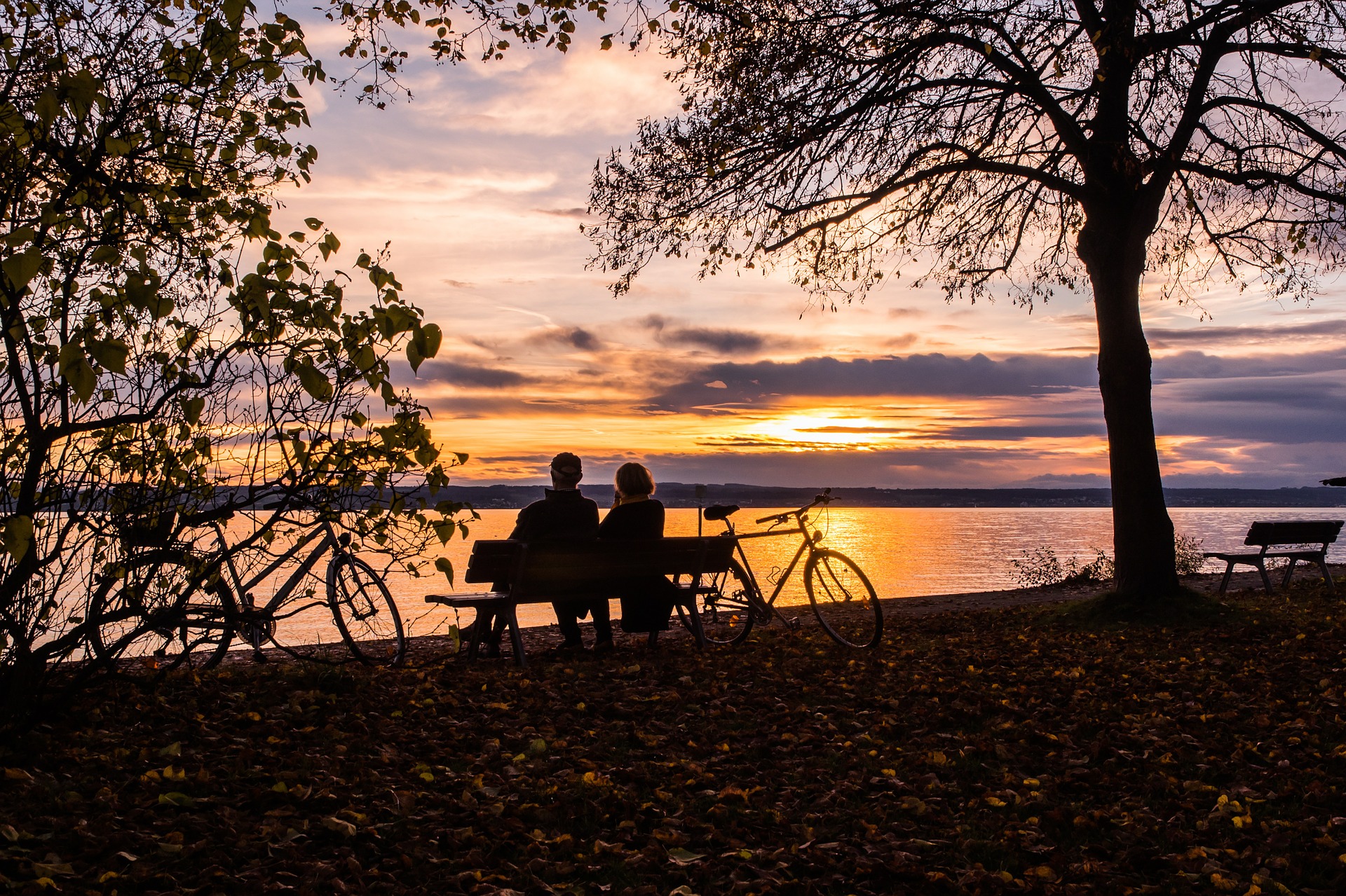 Couple Sitting at Sunset